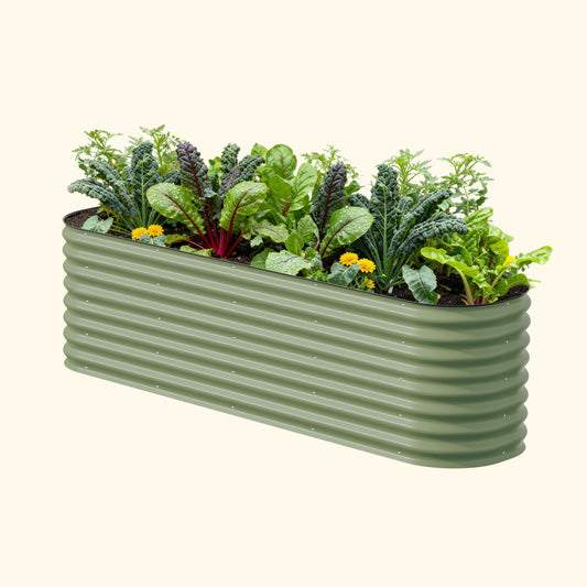 26-inch tall modular metal raised garden bed kit assembled with soil and mixed vegetables in backyard