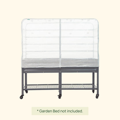 Green frost cover and trellis system installed over an elevated wooden garden bed protecting seedlings