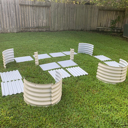 Assembled 17-inch U-shaped raised garden bed in a backyard, filled with soil and ready for planting