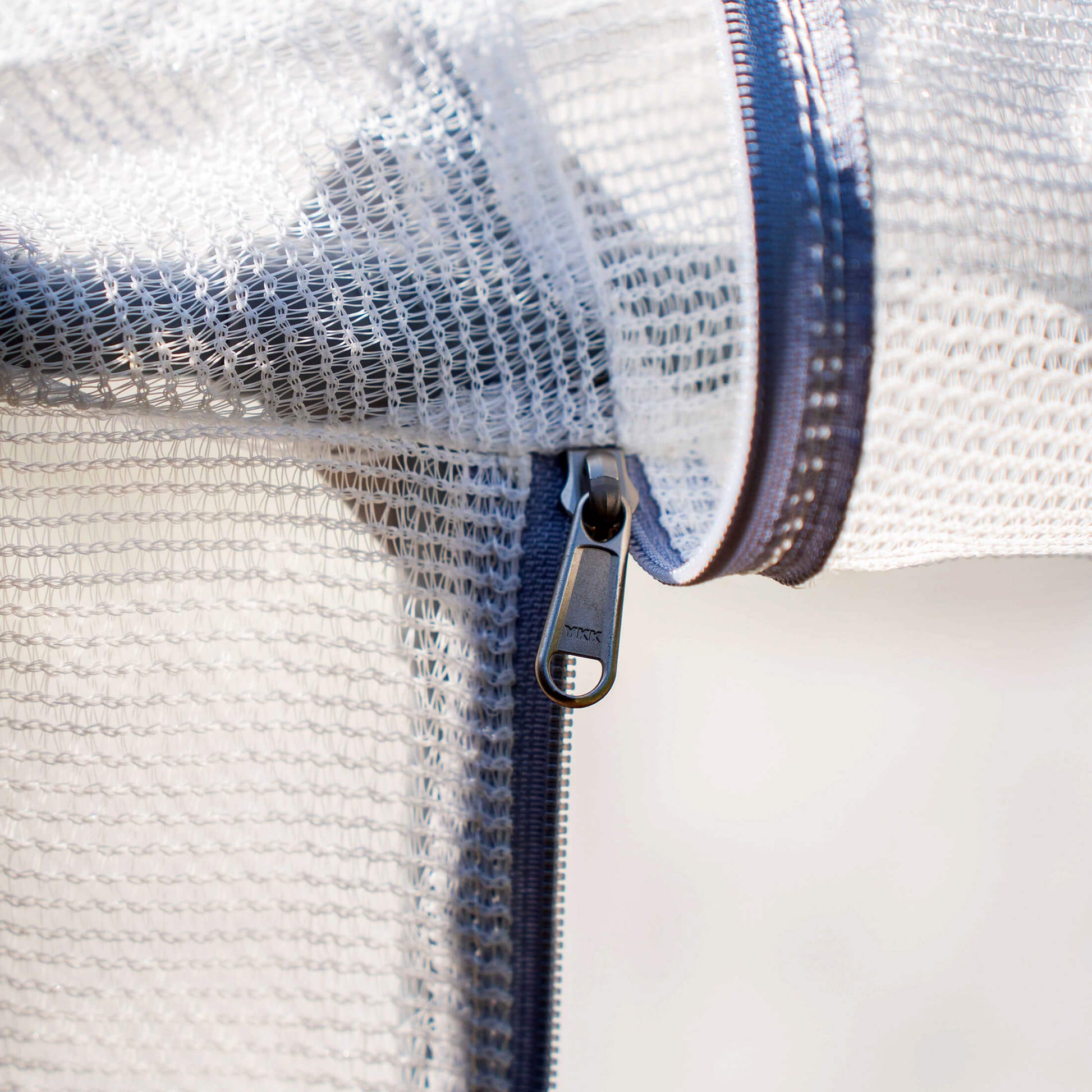 Expandable mesh cover system with ventilated panels and zippered access for protecting plants from pests and weather