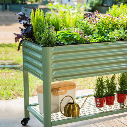 Wooden raised garden bed planter 2x6 ft with slatted sides filled with soil and young vegetable seedlings