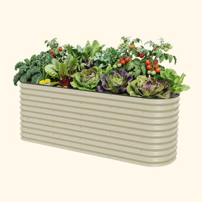 Extra-tall modular metal raised garden bed assembled outdoors with lush vegetables and herbs in raised panels