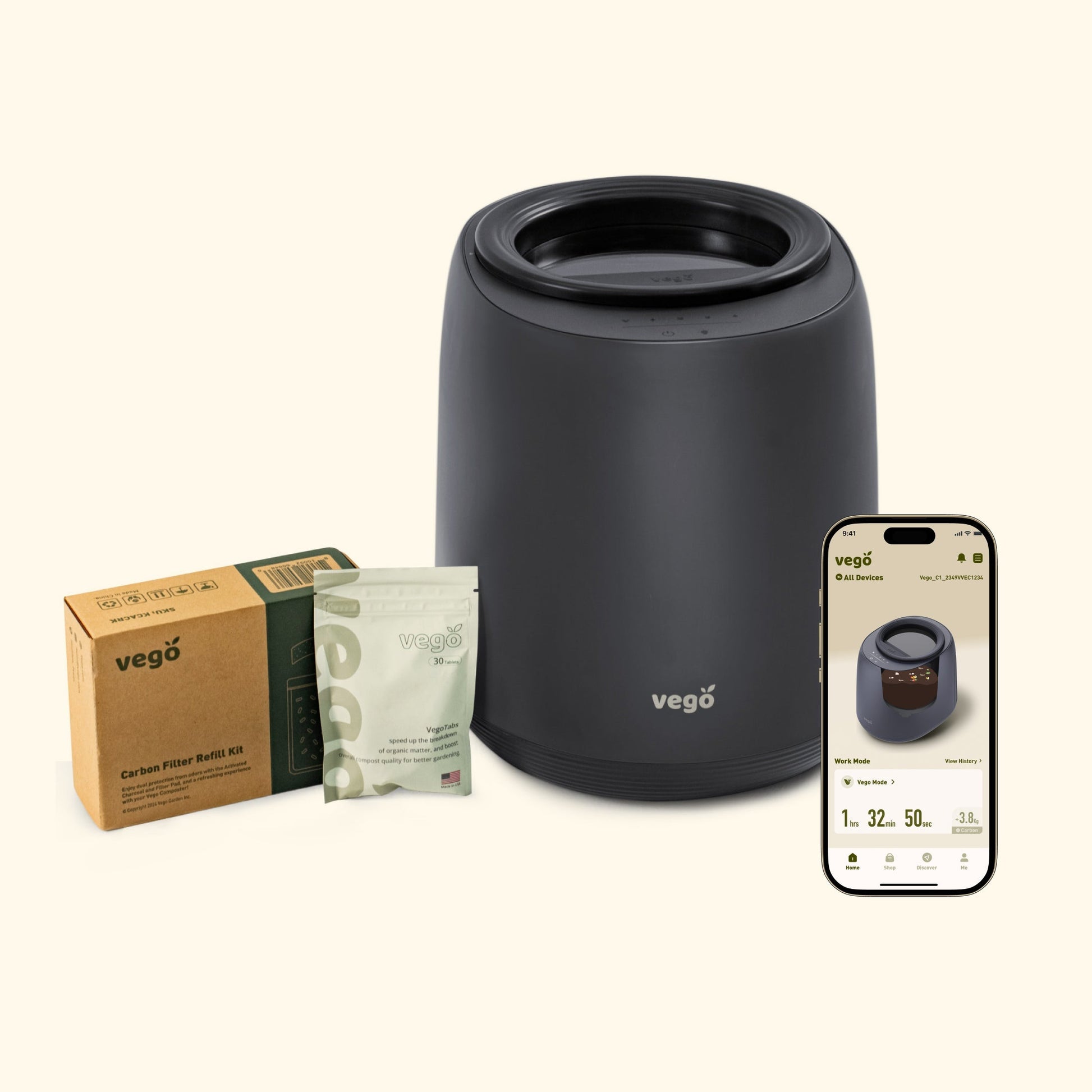 Small matte white countertop compost bin with flip-top lid and wooden handle on a kitchen counter next to fresh vegetables