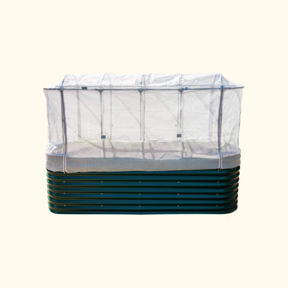 Ventilated mesh cover with zippered corner and elastic hem draped over raised garden bed to keep pests out