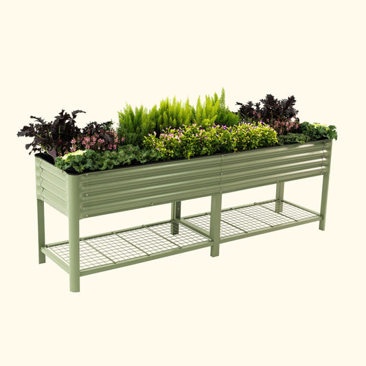 Raised rectangular garden bed frame 2 x 8 feet assembled on lawn with soil inside