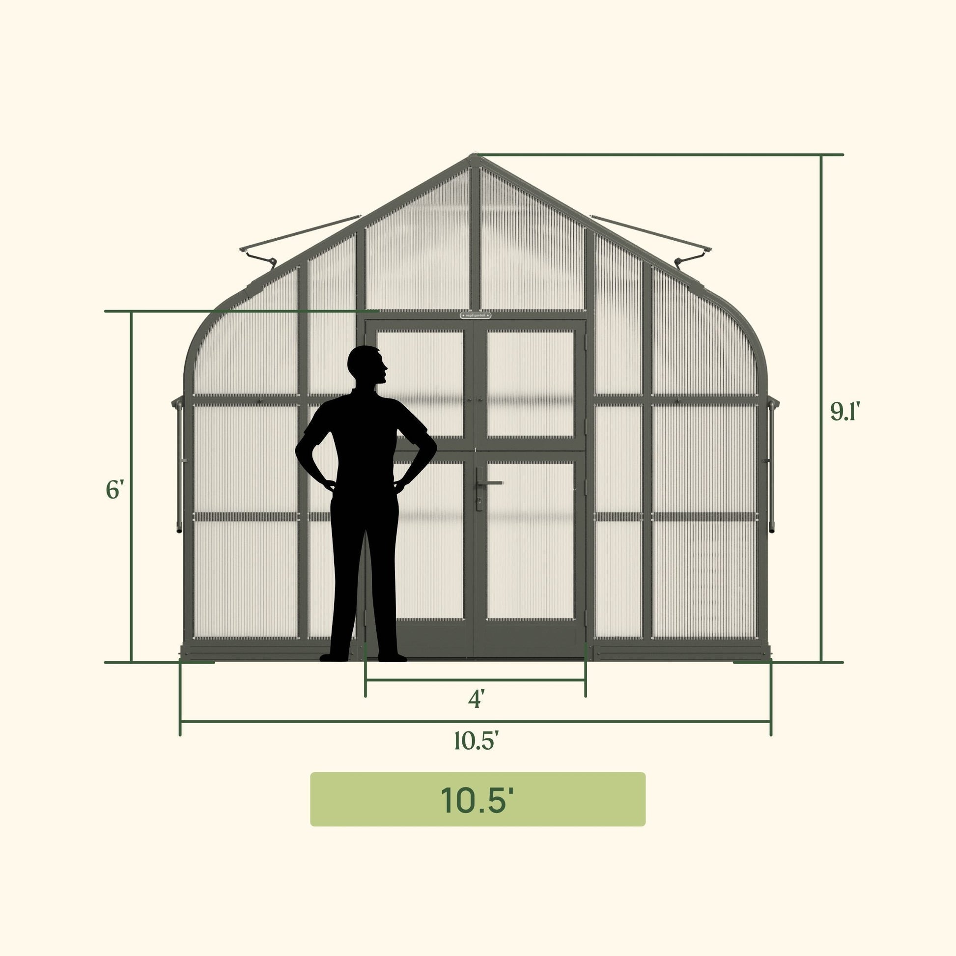 Large Pacific-style greenhouse with glass panels and vented roof sitting on a backyard patio surrounded by plants