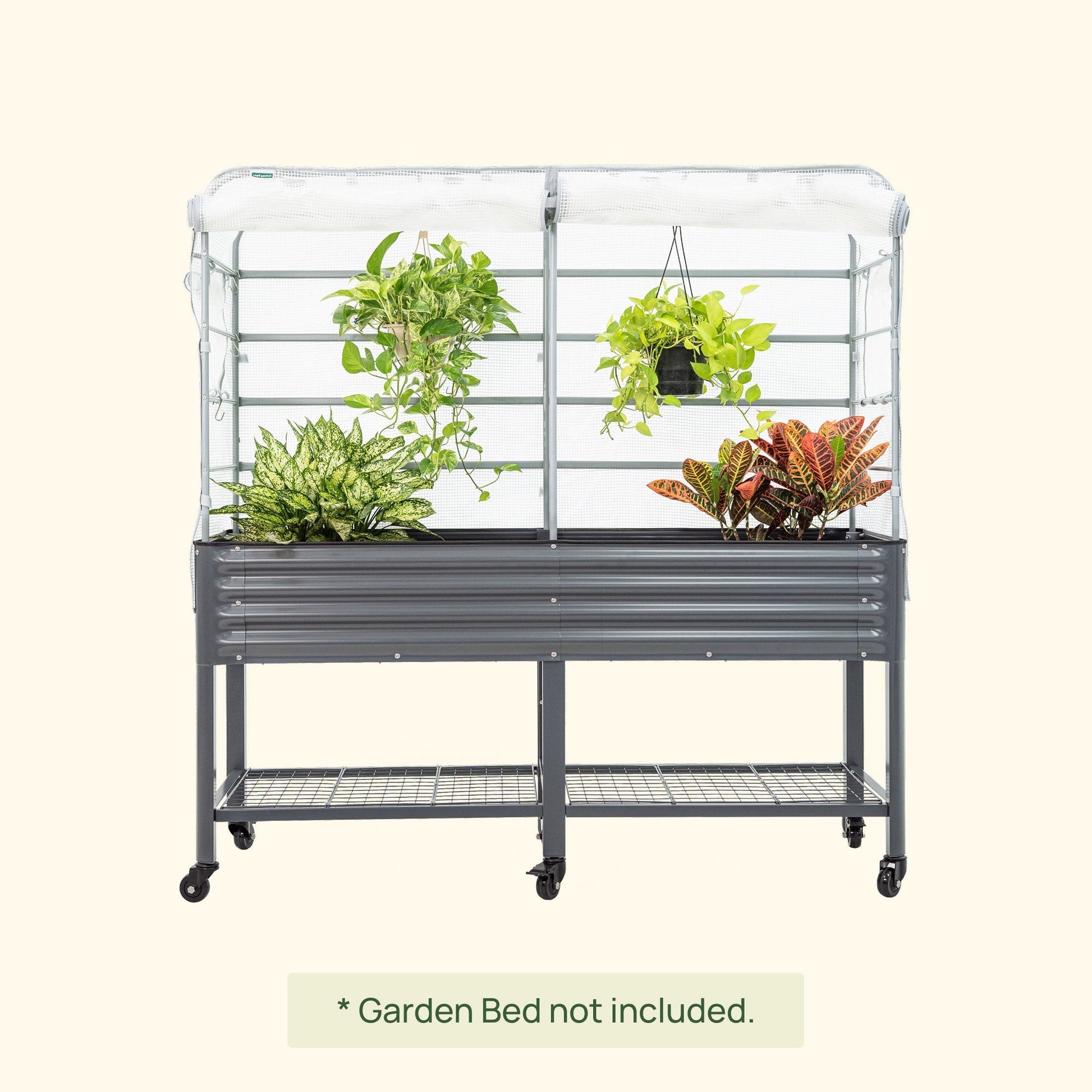 Green frost cover with arched trellis fitted over an elevated garden bed to protect seedlings from cold