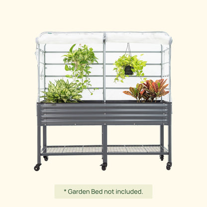 Green frost cover with arched trellis fitted over an elevated garden bed to protect seedlings from cold