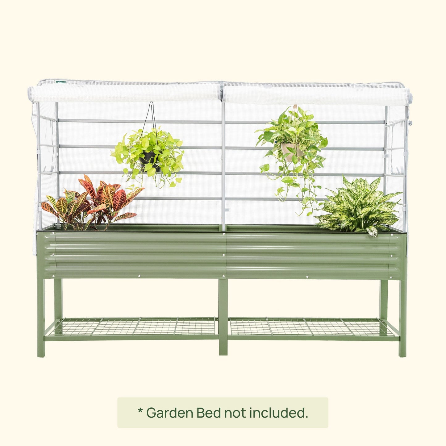 Green frost cover and trellis system attached to an elevated garden bed protecting young plants