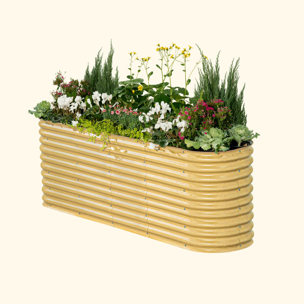 Extra-tall 32-inch modular metal raised garden bed assembled outdoors with rich soil and seedlings