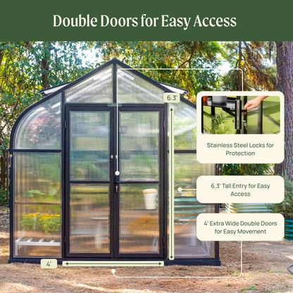 8.5ft wide Pacific greenhouse in Pacific green with curved roof and double doors on a gravel backyard pad