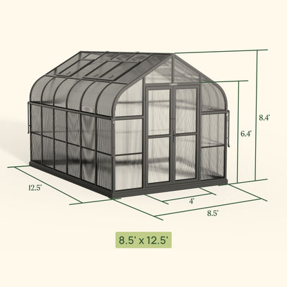 8.5ft wide greenhouse with clear panels and double doors set in a backyard garden
