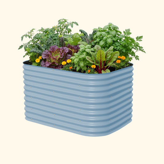 Extra-tall 32-inch metal raised garden bed kit assembled outdoors with soil and starter plants